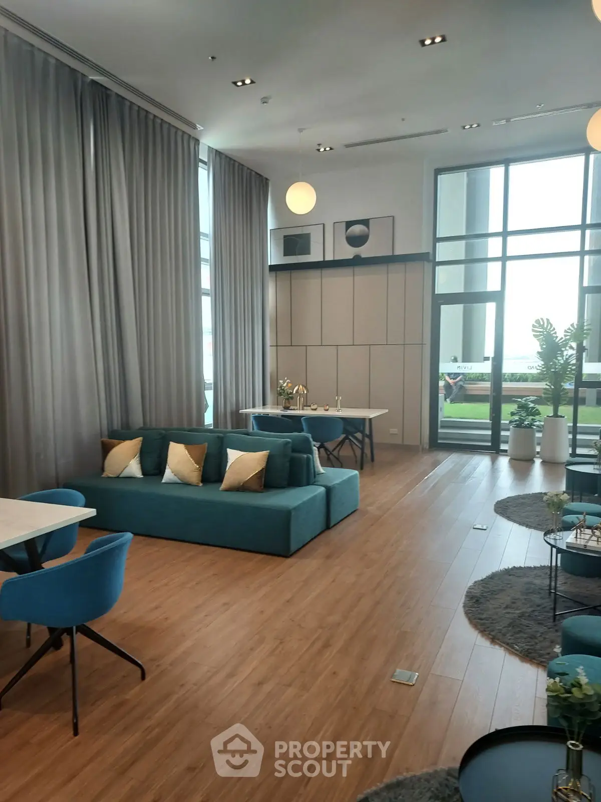 Spacious modern living room with high ceilings and elegant decor
