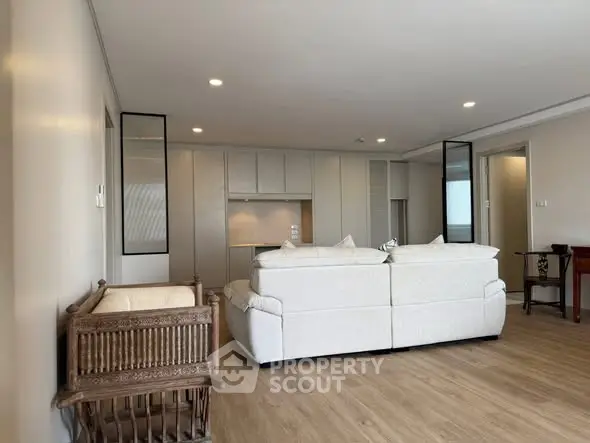 Spacious modern living room with elegant decor and comfortable seating