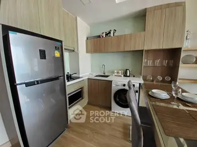 Modern kitchen with sleek appliances and stylish cabinetry