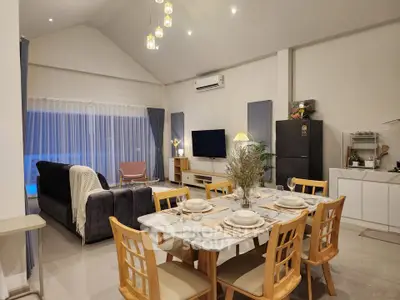 Spacious modern living room with dining area and stylish decor