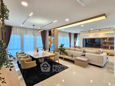 Luxurious modern living room with elegant dining area and stylish decor