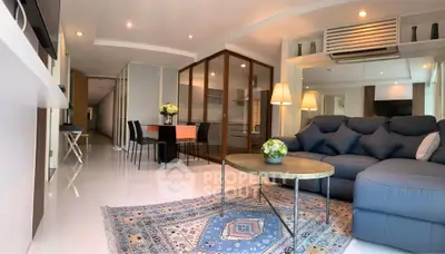 Spacious modern living room with elegant decor and cozy seating area