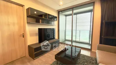 Modern living room with sleek furniture and balcony view
