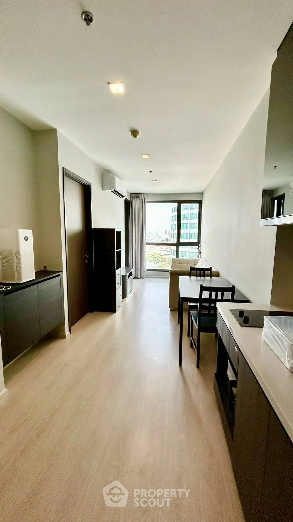 Modern apartment interior with open layout and city view