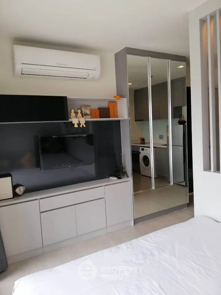 Modern apartment interior with sleek design and built-in appliances
