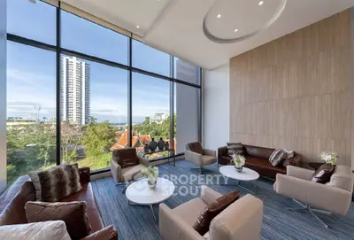 Luxurious living room with panoramic city view and modern furnishings