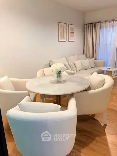 Elegant living room with cozy seating and stylish decor