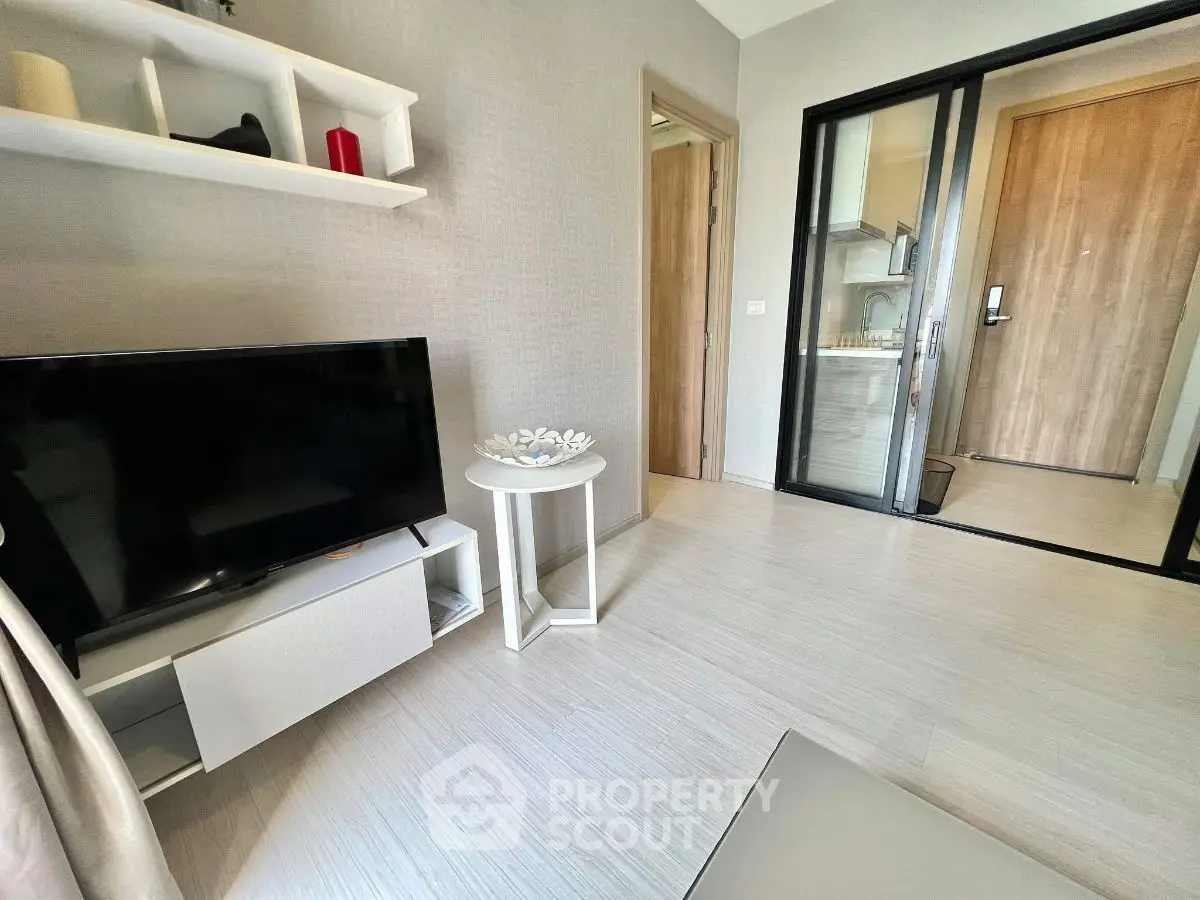 Modern living room with sleek TV and stylish decor