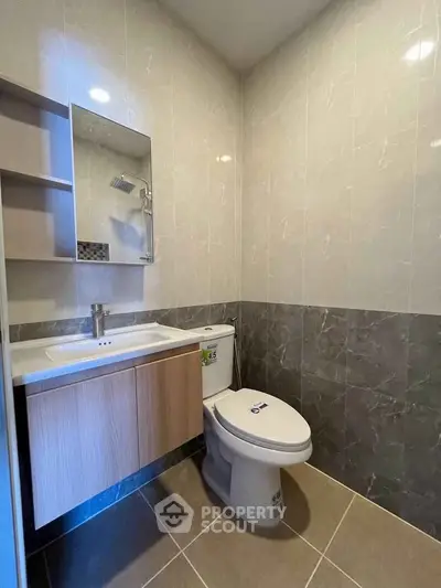 Modern bathroom with sleek fixtures and elegant tile design