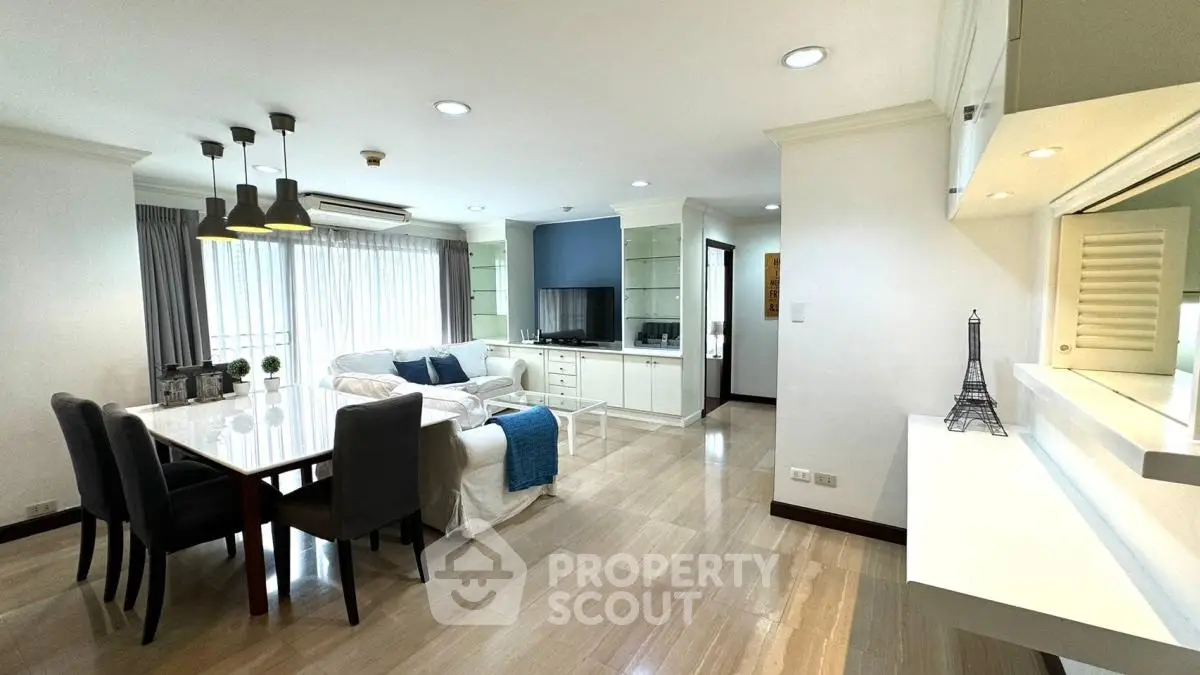 Spacious modern living room with elegant dining area and natural light