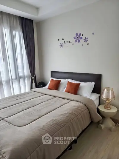 Cozy bedroom with elegant decor and natural light