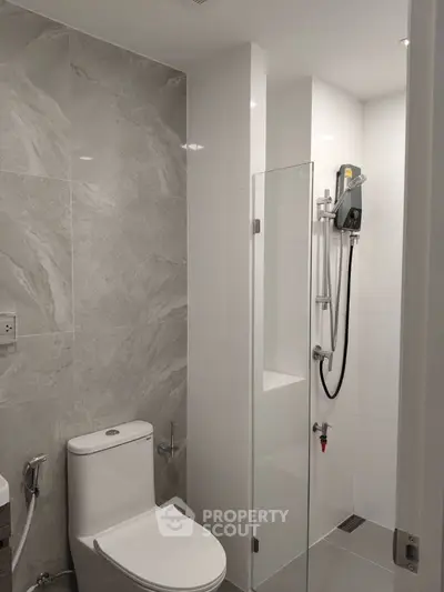 Modern bathroom with sleek shower and elegant tile design