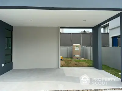 Modern covered parking space in contemporary residential property