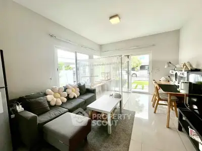 Modern living room with stylish decor and garden view