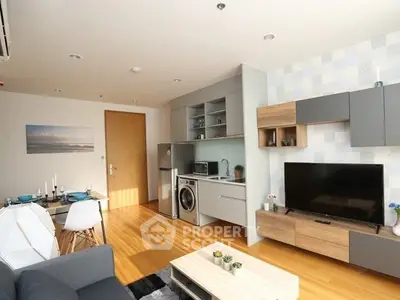 Modern living room with integrated kitchen and stylish decor