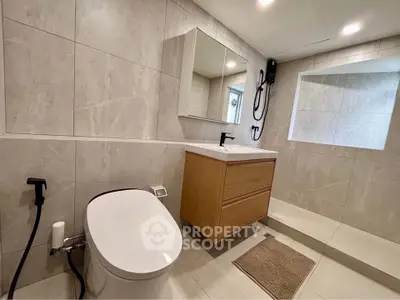 Modern bathroom with sleek fixtures and elegant tile design