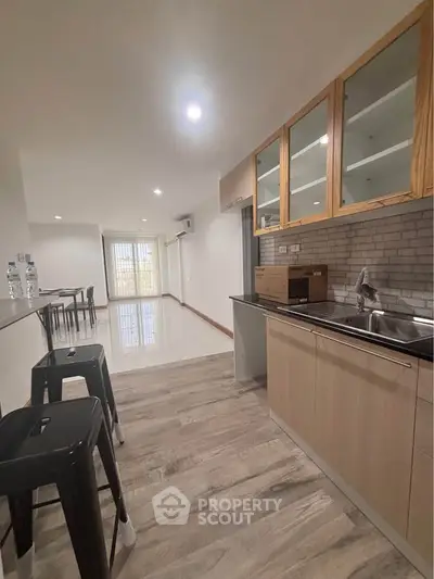 Modern open kitchen with sleek design and spacious living area