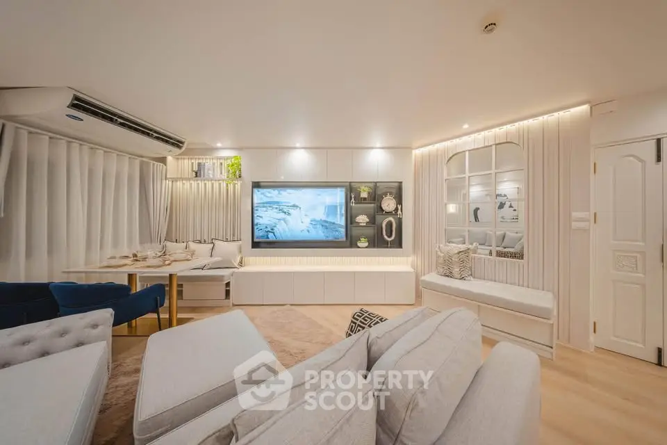 Luxurious modern living room with elegant decor and cozy seating area