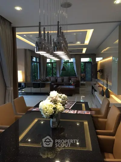 Luxurious open living room with modern lighting and elegant decor