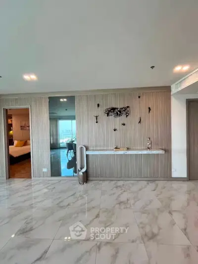 Spacious modern living room with marble flooring and elegant decor