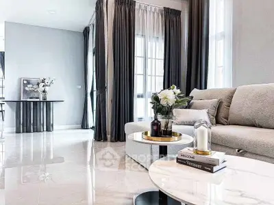 Elegant living room with modern decor and natural light