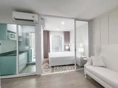 Modern apartment interior with open layout and stylish furnishings.