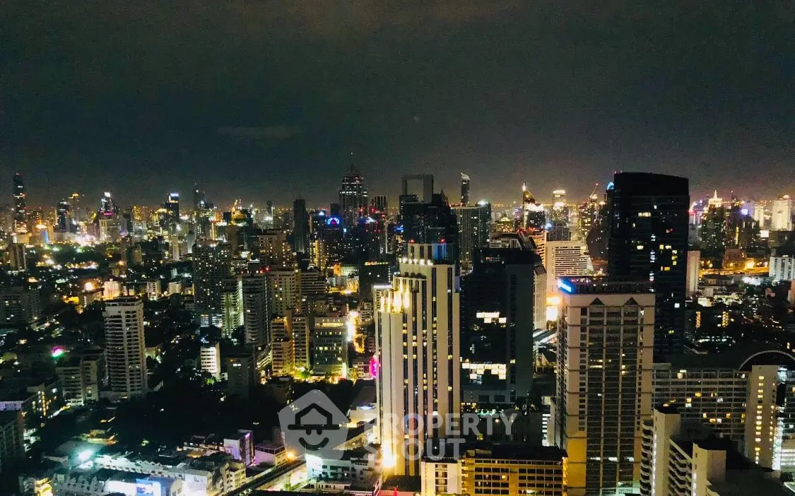 Stunning night cityscape view with illuminated skyscrapers and vibrant skyline.