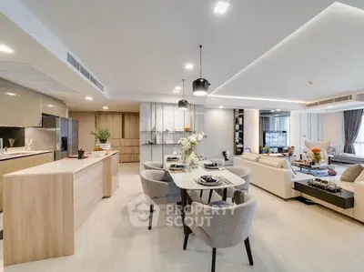 Luxurious open-plan living and dining area with modern furnishings and elegant decor.