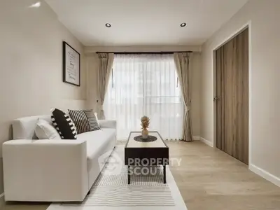 Modern living room with stylish decor and natural light, featuring a cozy sofa and elegant curtains.