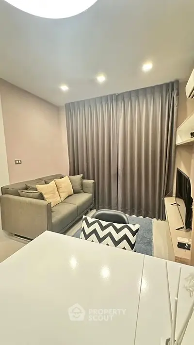 Modern living room with cozy sofa and stylish decor in a contemporary apartment