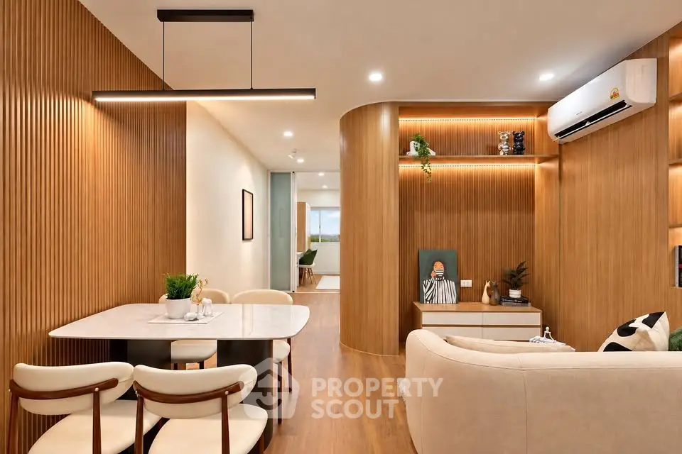 Modern living room with elegant wood paneling and stylish furniture, perfect for contemporary living.