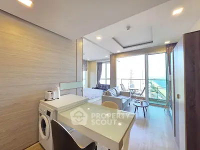 Modern open-plan apartment with washing machine and stunning city view
