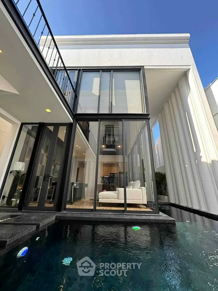 Luxurious modern villa with stunning pool and elegant architecture