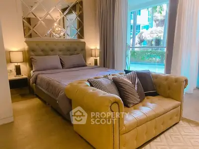 Luxurious bedroom with elegant decor and plush seating, perfect for relaxation.