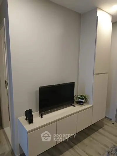 Modern living room with sleek TV stand and minimalist decor