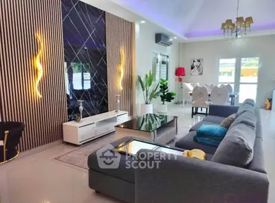 Luxurious modern living room with stylish decor and spacious seating area, perfect for relaxation and entertainment.