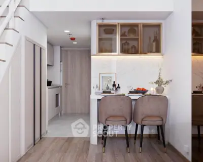 Modern kitchen with stylish bar seating and elegant decor