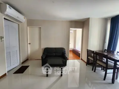 Modern living room with sleek furniture and open layout