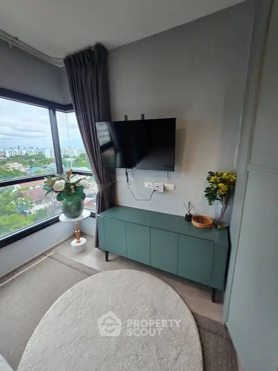 Stylish corner unit with modern decor and large windows offering a stunning city view.