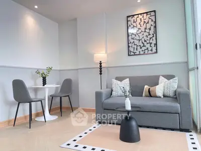 Modern living room with stylish decor and cozy seating area