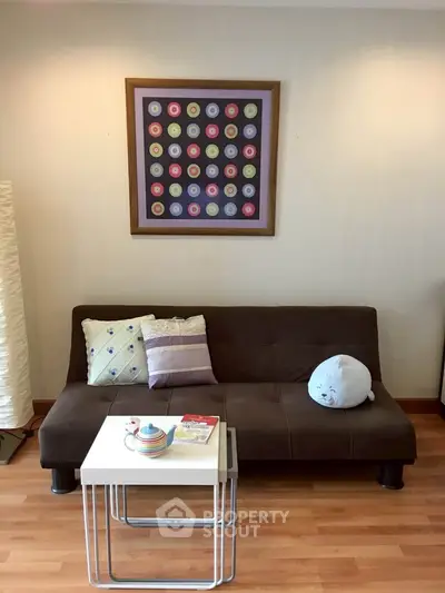 Cozy living room with modern decor and comfortable seating