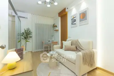 Modern living room with cozy decor, stylish furniture, and ambient lighting in a contemporary apartment.