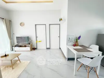 Modern living room with stylish furniture and bright natural lighting