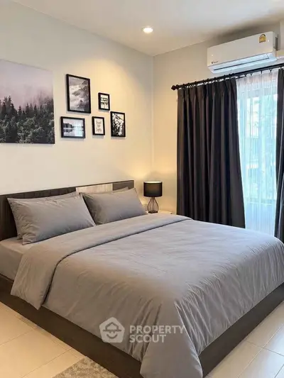 Modern bedroom with stylish decor and natural light