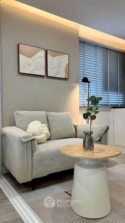 Modern living room with cozy armchair and stylish decor