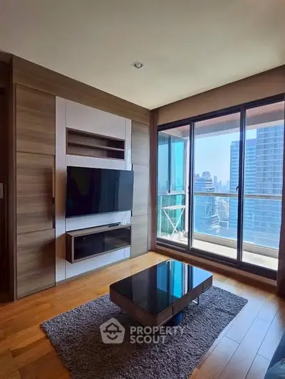 Modern living room with city view and sleek furniture