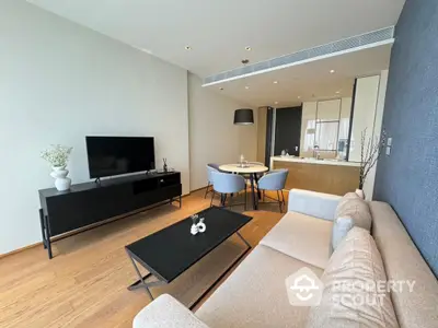 Modern living room with sleek furniture and open layout in luxury apartment