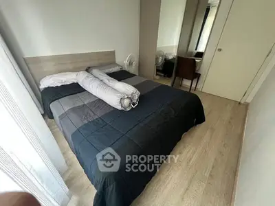 Cozy bedroom with modern decor and natural light