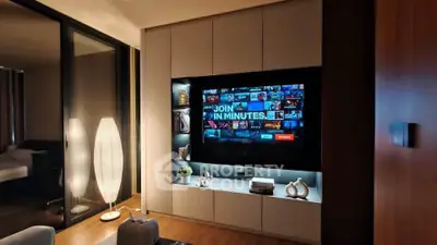 Modern living room with sleek entertainment center and ambient lighting