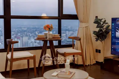 Chic living room with stunning city view and elegant decor